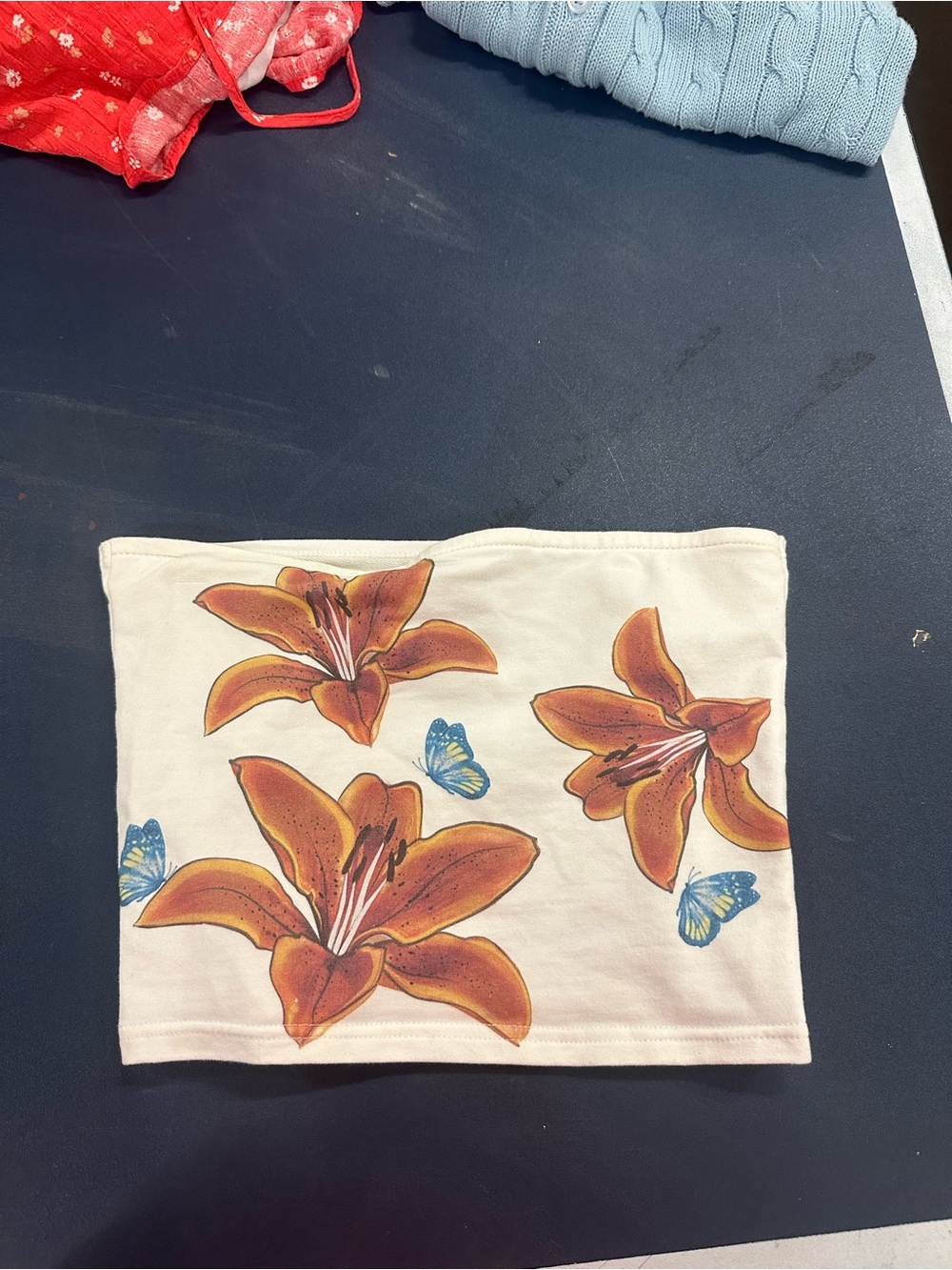 Edikted White Floral Tube Top with Orange Lilies and Blue Butterflies